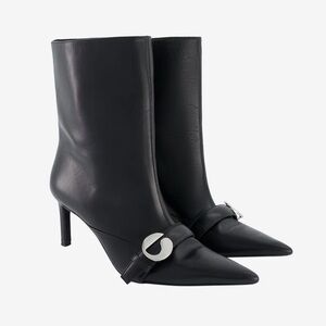 Coperni Black Pointed Leather Ankle Boots with Silver Accent